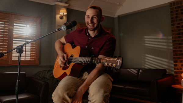 Harper-Sky-Solo-Acoustic-Wedding-Musician-Laughing-Medium